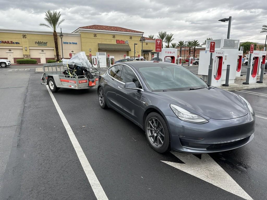 Cybercab Robotaxi Towing my new Zero electric bike with the Tesla 1692632533671