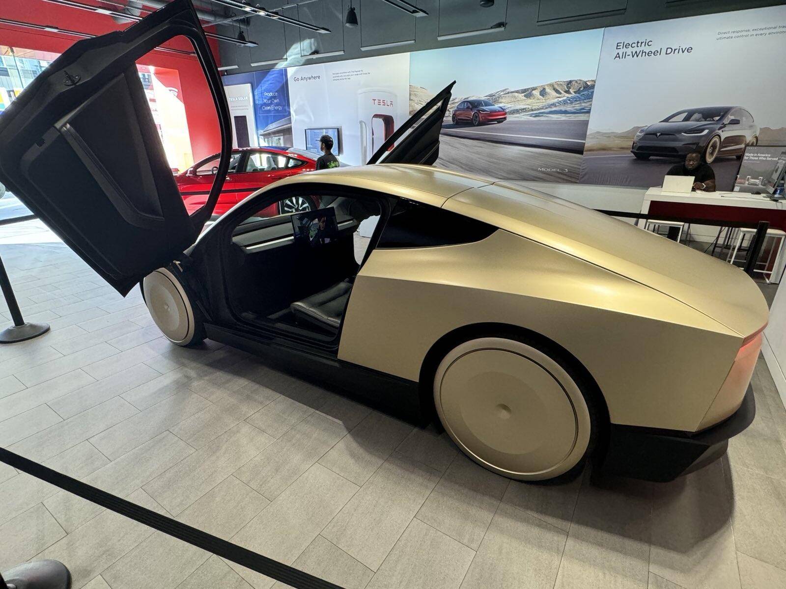 Cybercab Robotaxi Cybercab Robotaxi displayed at Plano, Texas Tesla Showroom 1731448526409-x4