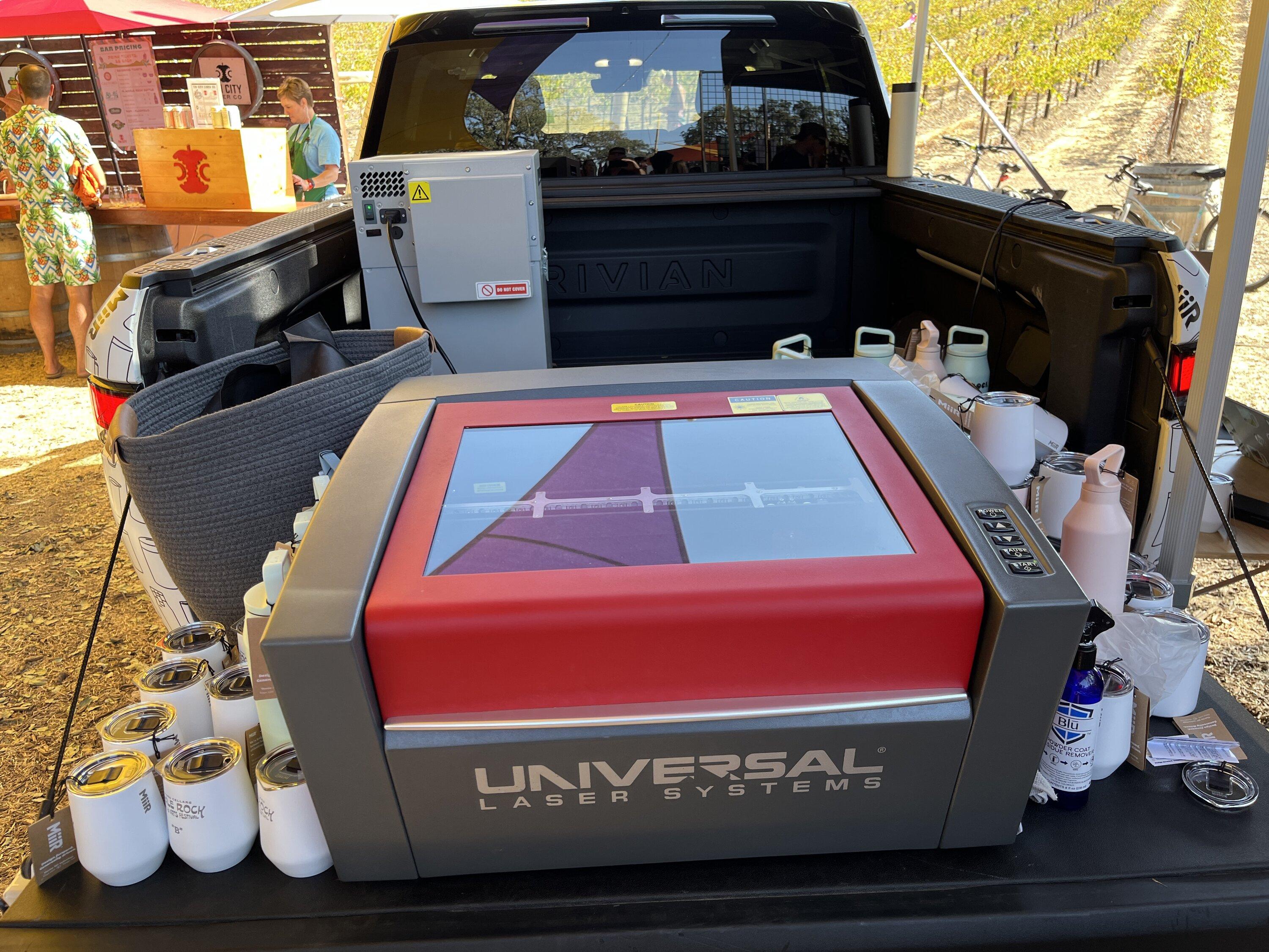 Cybercab Robotaxi Rivian powers laser engraver at music festival C3065197-AE24-4BC9-AC44-D78163885C8F