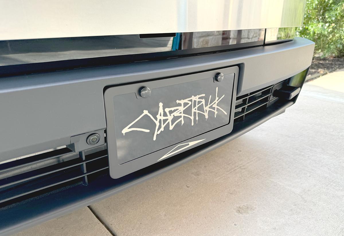 Cybercab Robotaxi ? [Giveaway] Custom License Plate Frame Raffle (with Your Text) + Discount Code club-vanity-cybertruck-graffiti-frame-left